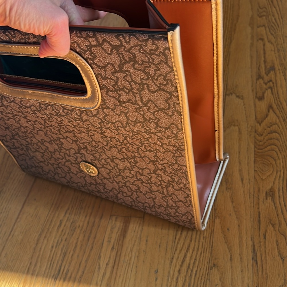 Tous leather medium clutch tote with brown Kaos Icon print and gold accents